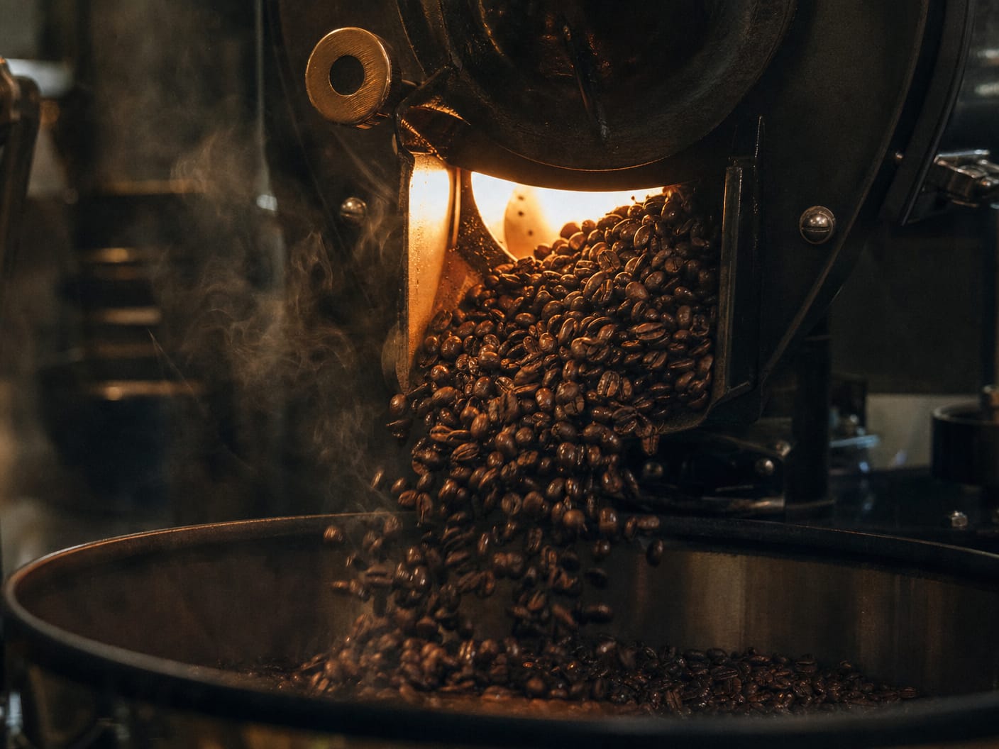 Coffee beans tumbling from roaster drum